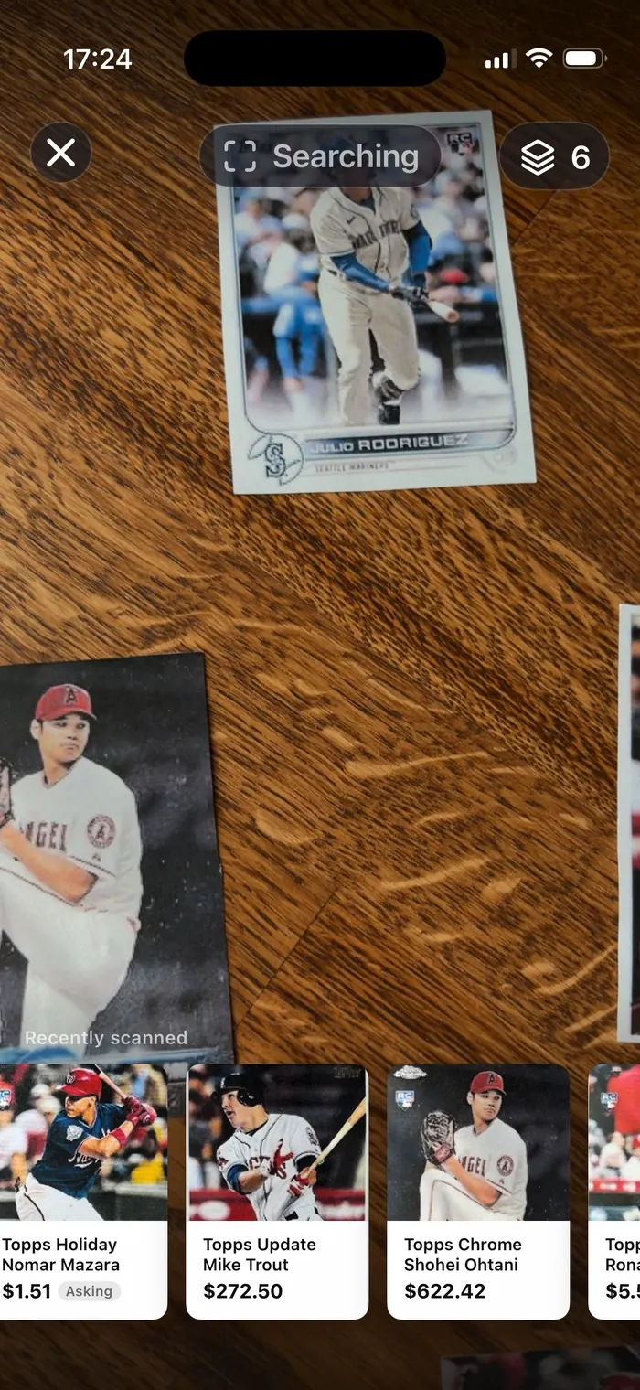 Camera pointed at cards spread across a table